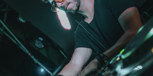 Hero image for the guide 'DJ Kerian: The Sound Architect of Mallorca's Elite Events'